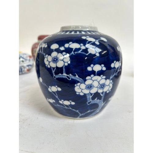 125 - A Chinese blue and white porcelain prunus pattern ginger jars, a soapstone water buffalo, 13cm, etc