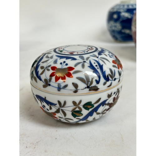 125 - A Chinese blue and white porcelain prunus pattern ginger jars, a soapstone water buffalo, 13cm, etc