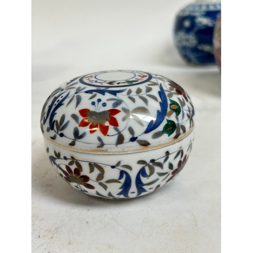125 - A Chinese blue and white porcelain prunus pattern ginger jars, a soapstone water buffalo, 13cm, etc