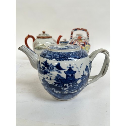 134 - A Chinese blue and white porcelain teapot, 16cm, and 2 others (3)