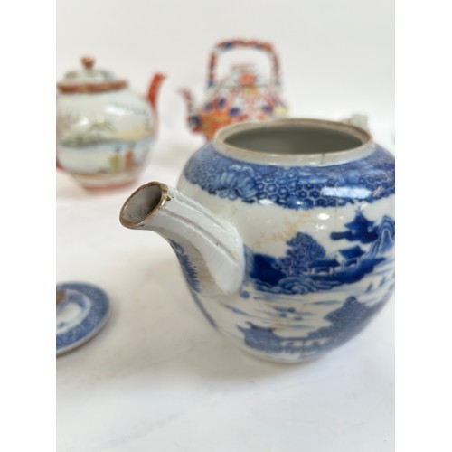 134 - A Chinese blue and white porcelain teapot, 16cm, and 2 others (3)