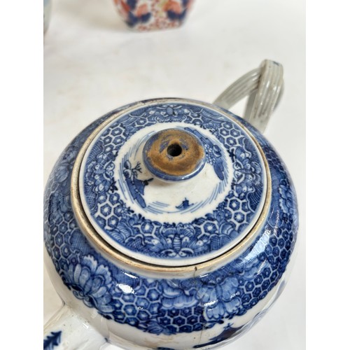 134 - A Chinese blue and white porcelain teapot, 16cm, and 2 others (3)