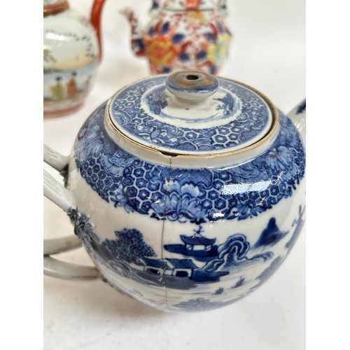 134 - A Chinese blue and white porcelain teapot, 16cm, and 2 others (3)