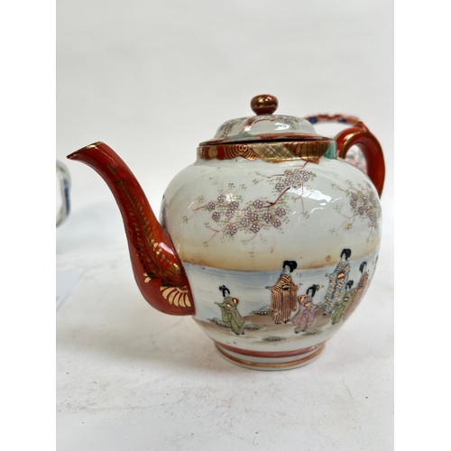 134 - A Chinese blue and white porcelain teapot, 16cm, and 2 others (3)