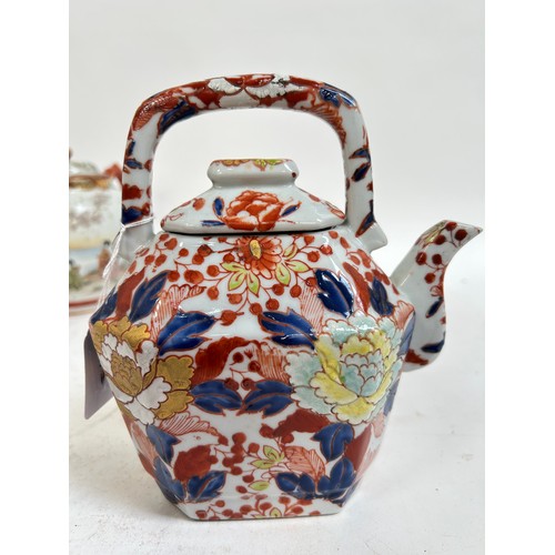 134 - A Chinese blue and white porcelain teapot, 16cm, and 2 others (3)