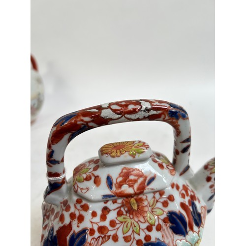 134 - A Chinese blue and white porcelain teapot, 16cm, and 2 others (3)