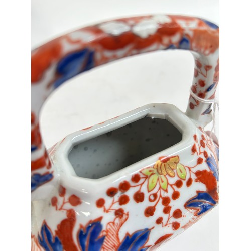 134 - A Chinese blue and white porcelain teapot, 16cm, and 2 others (3)