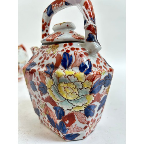 134 - A Chinese blue and white porcelain teapot, 16cm, and 2 others (3)