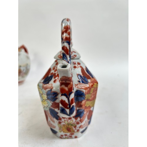 134 - A Chinese blue and white porcelain teapot, 16cm, and 2 others (3)