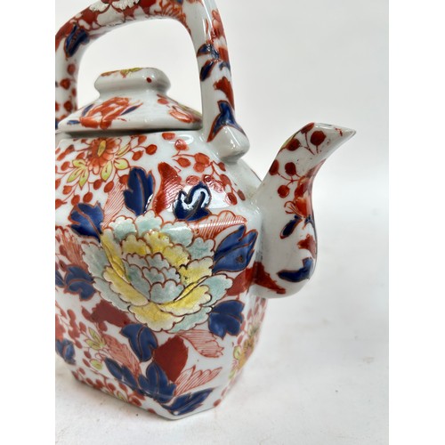 134 - A Chinese blue and white porcelain teapot, 16cm, and 2 others (3)
