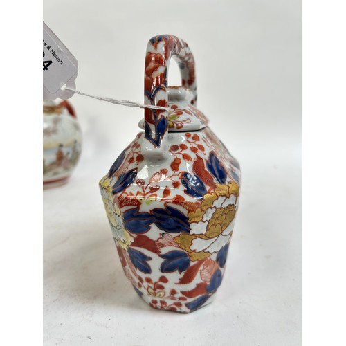 134 - A Chinese blue and white porcelain teapot, 16cm, and 2 others (3)