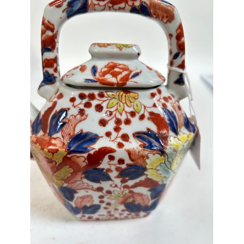 134 - A Chinese blue and white porcelain teapot, 16cm, and 2 others (3)