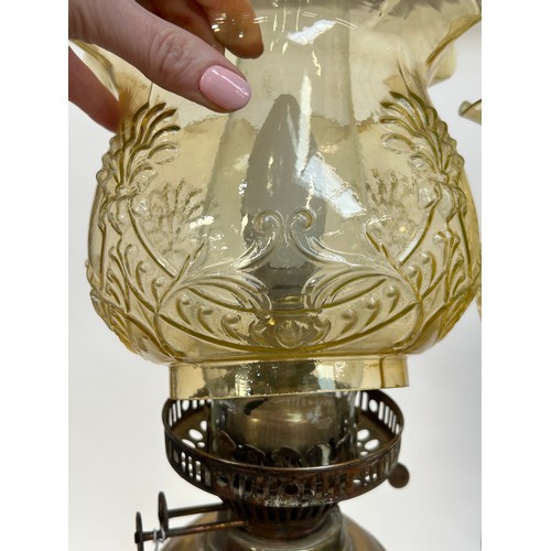 8 - A Victorian brass double oil lamp, with original moulded uranium glass shades and funnels, converted... 