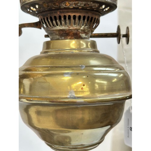 8 - A Victorian brass double oil lamp, with original moulded uranium glass shades and funnels, converted... 