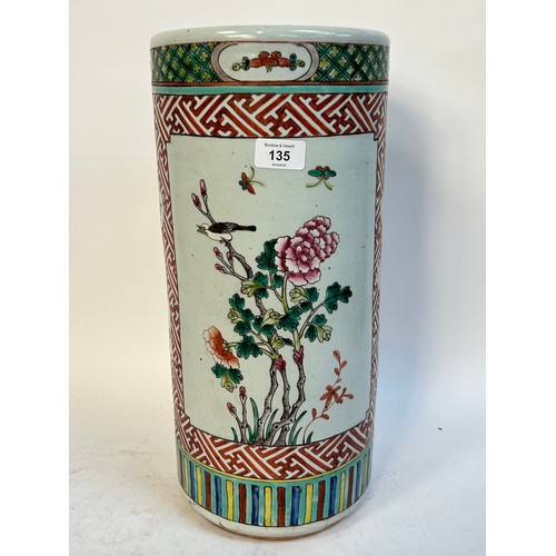 135 - A Chinese famille vert ceramic barrel stick stand, 45cm