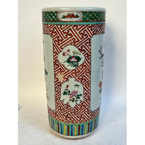 135 - A Chinese famille vert ceramic barrel stick stand, 45cm
