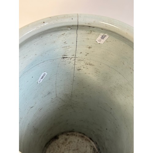 135 - A Chinese famille vert ceramic barrel stick stand, 45cm