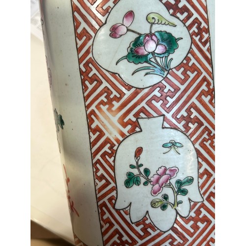 135 - A Chinese famille vert ceramic barrel stick stand, 45cm