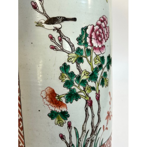 135 - A Chinese famille vert ceramic barrel stick stand, 45cm