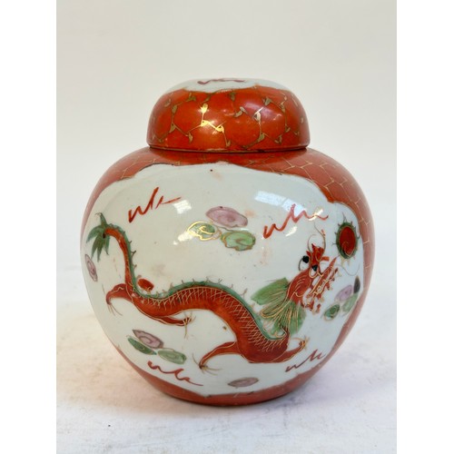 140 - 2 Chinese blue and white prunus pattern ginger jars and covers, and another, largest 15cm (3)