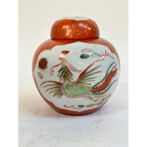 140 - 2 Chinese blue and white prunus pattern ginger jars and covers, and another, largest 15cm (3)