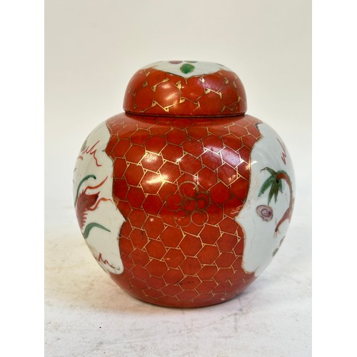 140 - 2 Chinese blue and white prunus pattern ginger jars and covers, and another, largest 15cm (3)