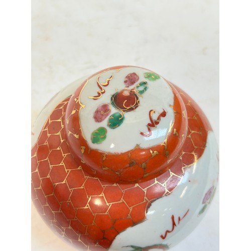 140 - 2 Chinese blue and white prunus pattern ginger jars and covers, and another, largest 15cm (3)