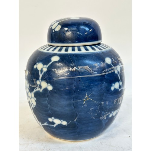 140 - 2 Chinese blue and white prunus pattern ginger jars and covers, and another, largest 15cm (3)