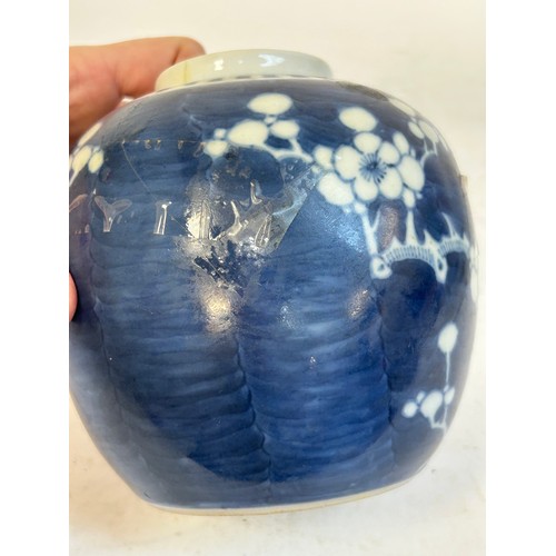140 - 2 Chinese blue and white prunus pattern ginger jars and covers, and another, largest 15cm (3)