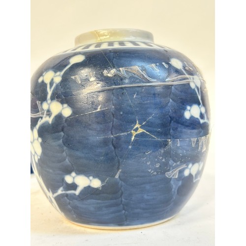 140 - 2 Chinese blue and white prunus pattern ginger jars and covers, and another, largest 15cm (3)