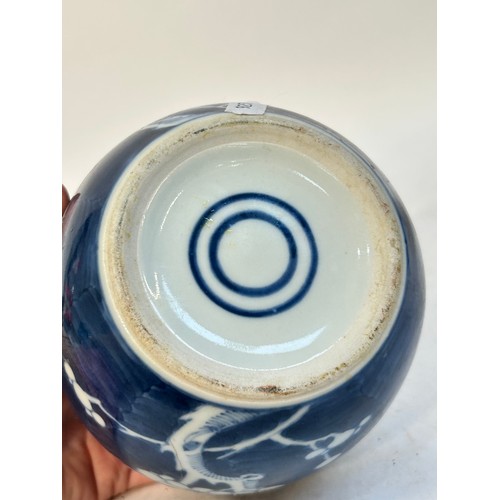 140 - 2 Chinese blue and white prunus pattern ginger jars and covers, and another, largest 15cm (3)