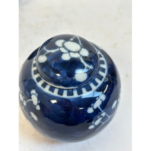 140 - 2 Chinese blue and white prunus pattern ginger jars and covers, and another, largest 15cm (3)