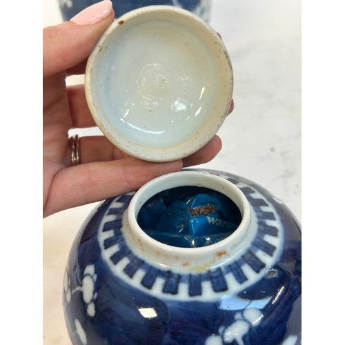 140 - 2 Chinese blue and white prunus pattern ginger jars and covers, and another, largest 15cm (3)