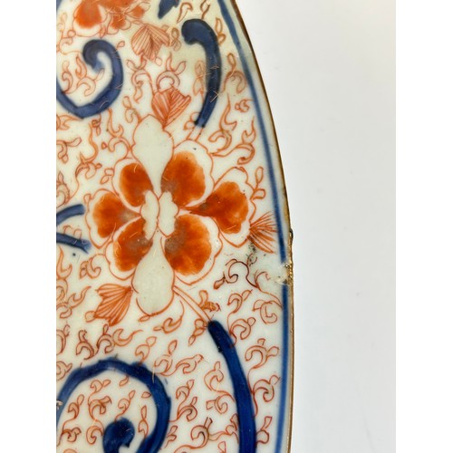 145 - A Chinese red blue and gilt decorated porcelain plate, diameter 39cm, and a Japanese blue ground pla... 