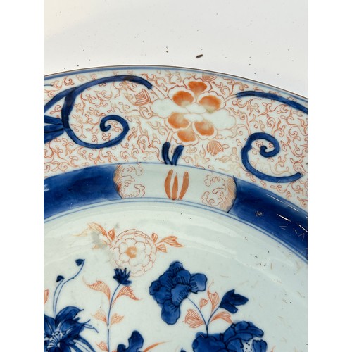145 - A Chinese red blue and gilt decorated porcelain plate, diameter 39cm, and a Japanese blue ground pla... 