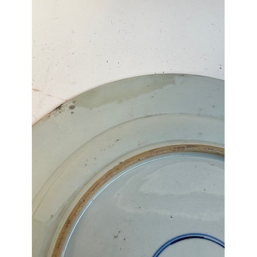 145 - A Chinese red blue and gilt decorated porcelain plate, diameter 39cm, and a Japanese blue ground pla... 