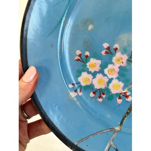 145 - A Chinese red blue and gilt decorated porcelain plate, diameter 39cm, and a Japanese blue ground pla... 