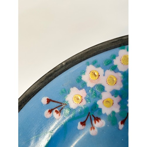 145 - A Chinese red blue and gilt decorated porcelain plate, diameter 39cm, and a Japanese blue ground pla... 
