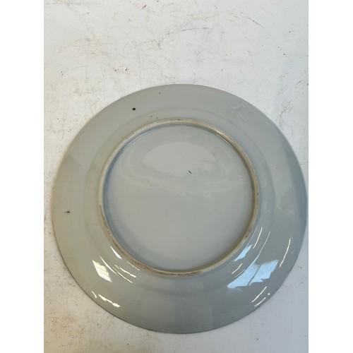 145 - A Chinese red blue and gilt decorated porcelain plate, diameter 39cm, and a Japanese blue ground pla... 