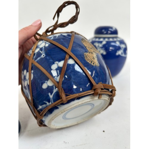 128 - 7 Chinese blue and white porcelain prunus pattern ginger jars and covers, largest 15cm