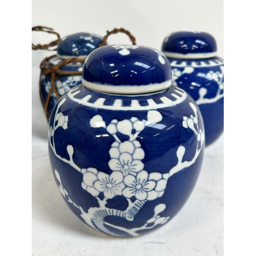 128 - 7 Chinese blue and white porcelain prunus pattern ginger jars and covers, largest 15cm