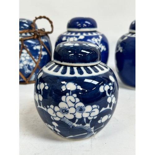 128 - 7 Chinese blue and white porcelain prunus pattern ginger jars and covers, largest 15cm