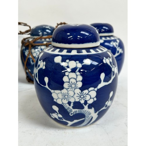 128 - 7 Chinese blue and white porcelain prunus pattern ginger jars and covers, largest 15cm