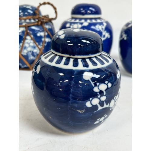 128 - 7 Chinese blue and white porcelain prunus pattern ginger jars and covers, largest 15cm