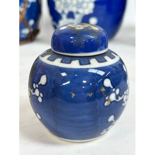 128 - 7 Chinese blue and white porcelain prunus pattern ginger jars and covers, largest 15cm