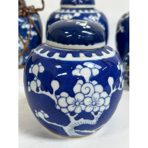 128 - 7 Chinese blue and white porcelain prunus pattern ginger jars and covers, largest 15cm