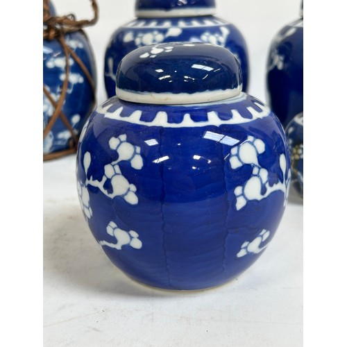 128 - 7 Chinese blue and white porcelain prunus pattern ginger jars and covers, largest 15cm