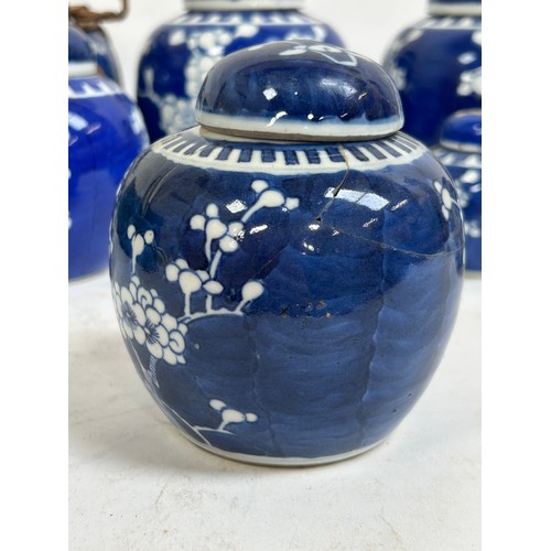 128 - 7 Chinese blue and white porcelain prunus pattern ginger jars and covers, largest 15cm