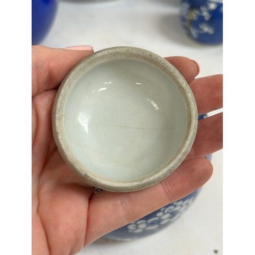 128 - 7 Chinese blue and white porcelain prunus pattern ginger jars and covers, largest 15cm