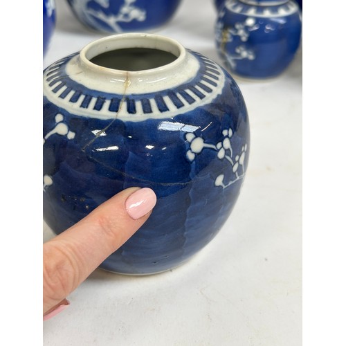 128 - 7 Chinese blue and white porcelain prunus pattern ginger jars and covers, largest 15cm